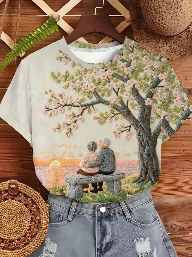 Cherry Blossom Tree and Couple on Beach Bench | Crew Neck, Short Sleeve T-Shirt