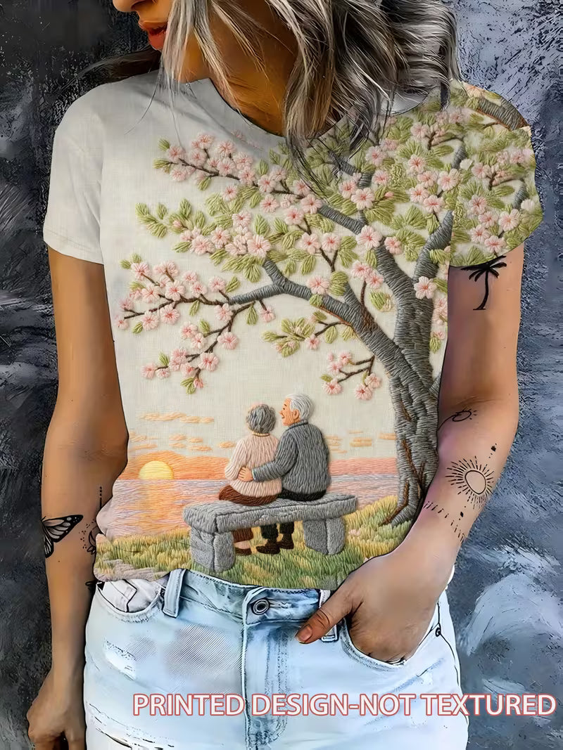 Cherry Blossom Tree and Couple on Beach Bench | Crew Neck, Short Sleeve T-Shirt