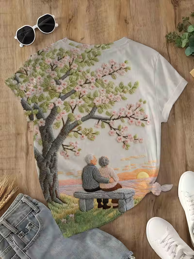Cherry Blossom Tree and Couple on Beach Bench | Crew Neck, Short Sleeve T-Shirt